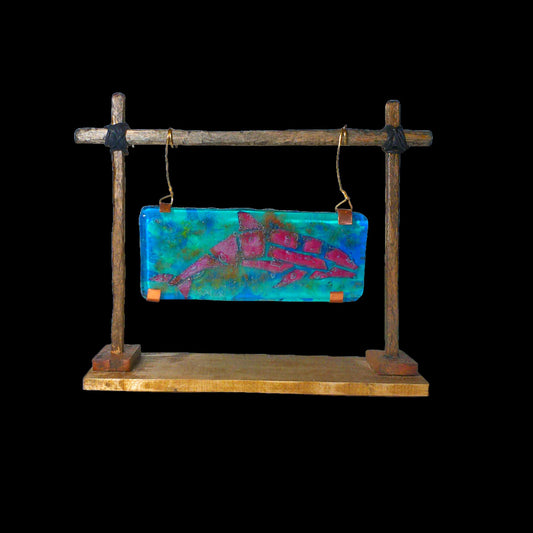 Copper Dolphin encased in fused glass hanging from a wooden stand all handcrafted free shipping