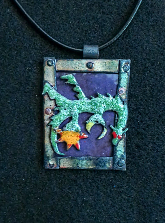 Dragon of the Moon and Sun a storytelling copper and enamel pendant featuring a celestial theme