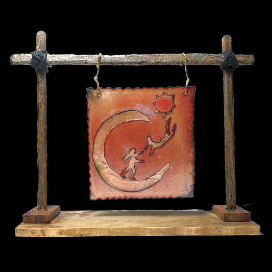 Throw Me to the Stars a copper sculpture displayed on a handcrafted wooden stand